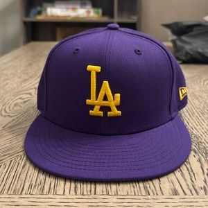 Brand new, never worn LA Dodgers hat. Downsizing my collection. Size 7.